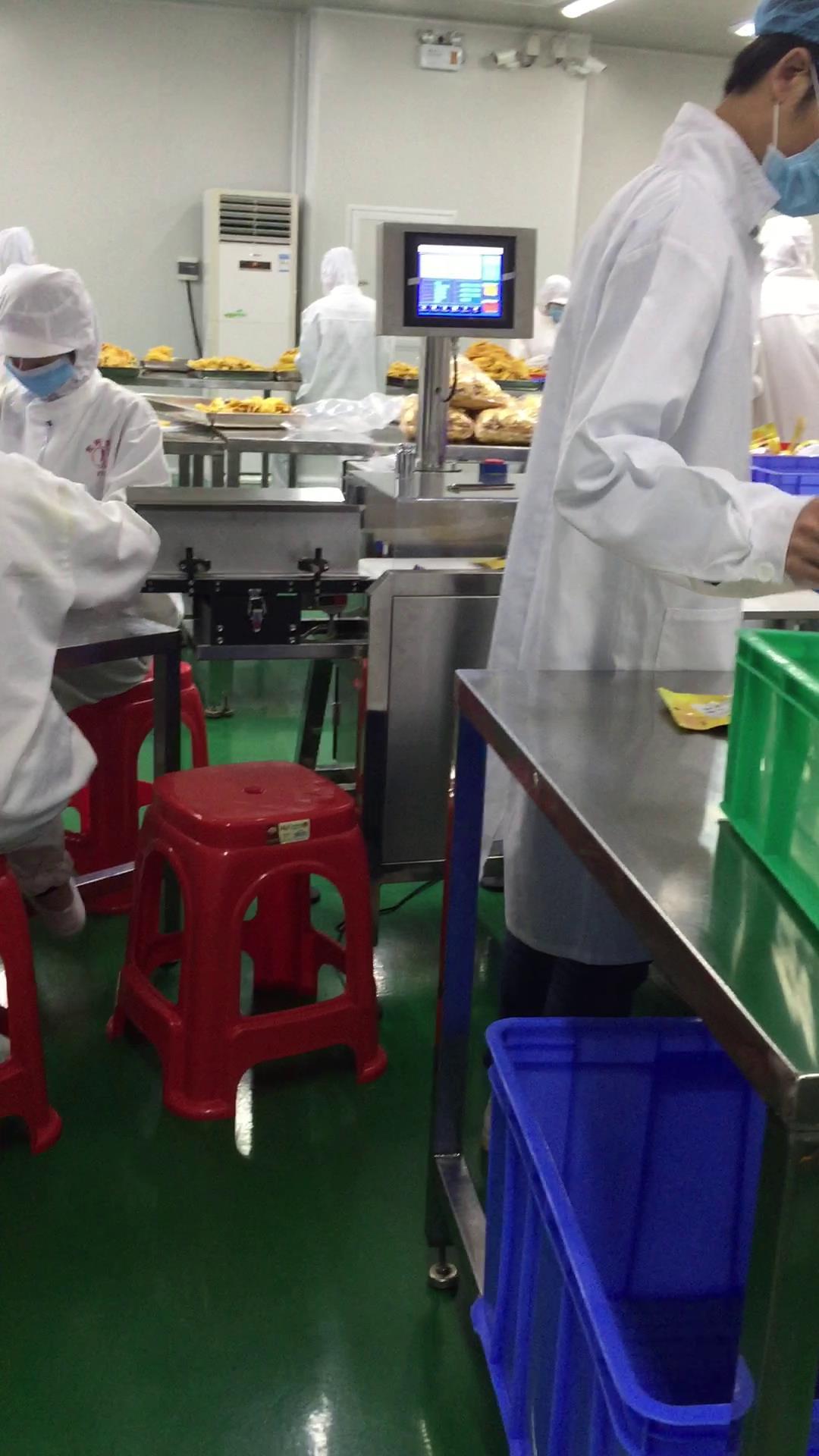 包装食品的合规性：如何确保产品重量合规，产线安装自动检重秤